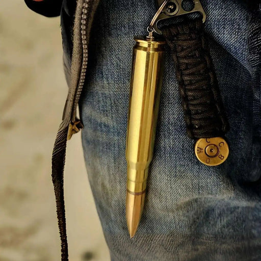 50 cal bmg bullet tungsten storage keychain hooked to carabiner on jean belt
