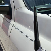 Gloss Black 50 BMG Bullet Antenna installed on White Toyota Tundra